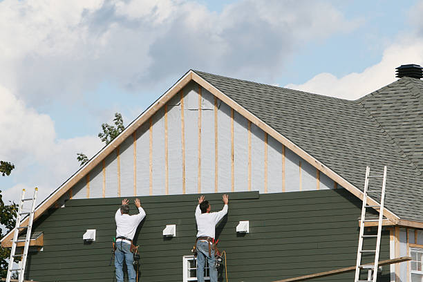 Professional Siding Replacement technician working in Knotts Island, NC